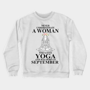 never underestimate a woman who loves yoga and was born in september Crewneck Sweatshirt